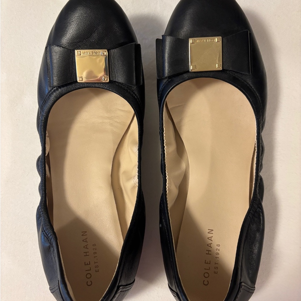 Cole Haan Black Leather Flats with Gold Accents